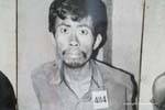 Prisioneiro aterrorizou fotografado na chegada ao Tuol Sleng, em Phnom Penh, Camboja.