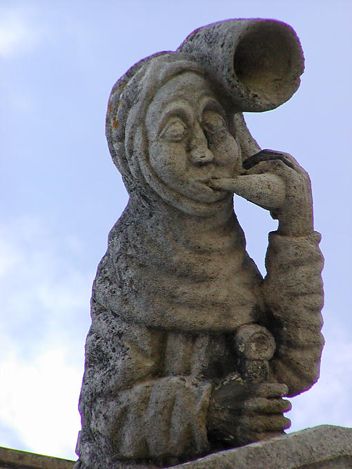 Escultura de pedra de um medieval sineiro, Castelo de Amboise, França.