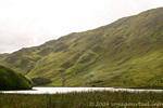 Lake Pollacappull para o castelo de Kylemore, Connemara, Irlanda.
