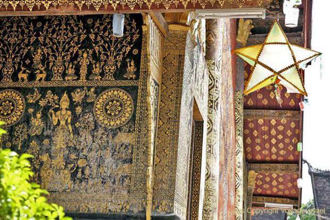 Deusa do leão com videiras em Sim, Wat Xieng Thong, Laos