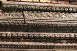 Repetição de esculturas finas, Wat Phou, Laos.
