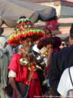 Um carregador de água, Jemaa el Fna, Marrakech, Marrocos.