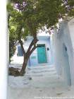 Laranja nas escadas, Chefchaouen, Marrocos.