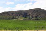 Montanhas e ovelhas, Queenstown Road to Invercargill, Southland, Nova Zelândia.