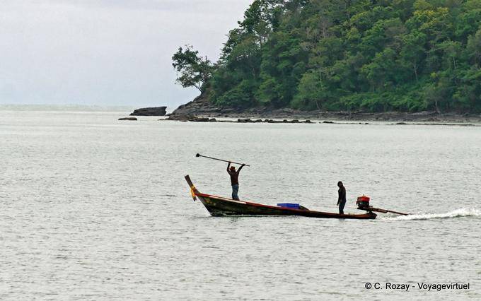 Um pescador em ação, Phuket Town Gypsy - Tailândia