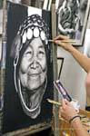 Artista reproduzindo um rosto típico, Chiang Mai, Tailândia.