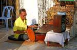 Músico religiosa, Wat Phra Si Rattana Mahathat, Phitsanulok, Tailândia.